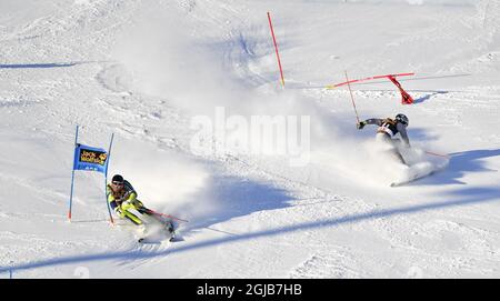 Der Schwede Andre Myhrer (L) tritt gegen den Franzosen Julien Lizeroux an, der während des alpinen Mannschaftsevents während des Finales des FIS Alpinen Ski-Weltcups in Are, Schweden, am 16. März 2018 abstürzt. Pto: Anders Wiklund / TT / 10040 Stockfoto