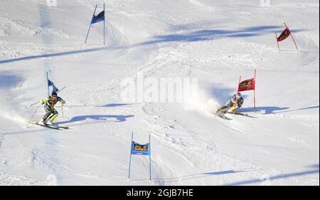 Der Schwede Andre Myhrer (L) tritt gegen den Franzosen Julien Lizeroux an, der während des alpinen Mannschaftsevents während des Finales des FIS Alpinen Ski-Weltcups in Are, Schweden, am 16. März 2018 abstürzt. Pto: Anders Wiklund / TT / 10040 Stockfoto