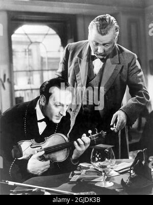 BASIL RATHBONE UND NIGEL BRUCE IN DEN ABENTEUERN VON SHERLOCK HOLMES (1939) UNTER DER REGIE VON ALFRED L. WERKER. Kredit: 20TH CENTURY FOX / Album Stockfoto