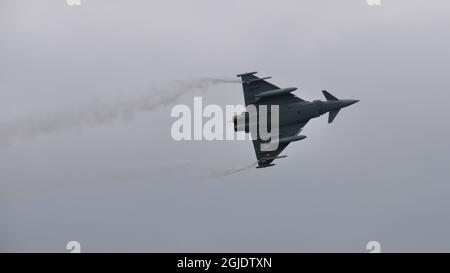 Zeltweg, Österreich 6. SEPTEMBER 2019 Jet-Jagdflugzeug-Ausstellung mit Rauch während einer Flugshow. Eurofighter Typhoon EFA der österreichischen Luftwaffe Stockfoto