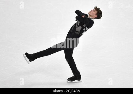 STOCKHOLM 20210325 Lukas Britschgi aus der Schweiz während des Männer-Kurzprogramms bei den ISU-Eiskunstlauf-Weltmeisterschaften in Schweden am donnerstag. Foto Jessica Gow / TT kod 10070 Stockfoto