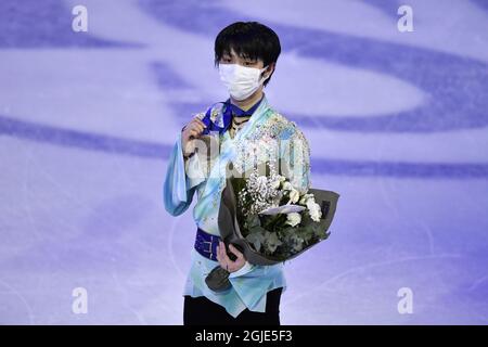 REDAKTION KORREKTUR DES NAMENS Yuzuru Hanyu aus Japan posiert mit seiner Bronzemedaille nach dem Freilaufen der Männer bei den ISU-Eiskunstlauf-Weltmeisterschaften in Stockholm, Schweden, 27. März 2021. Foto Jessica Gow / TT kod 10070 Stockfoto