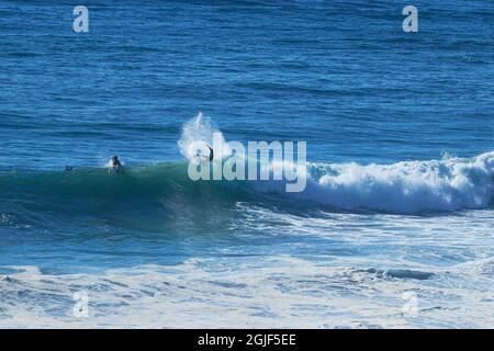 Surfer auf einer perfekten Welle Stockfoto