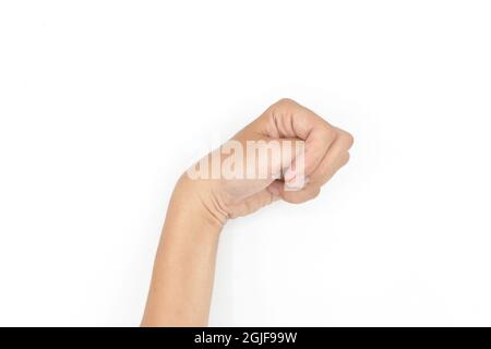 Krämpfe der Handmuskulatur beim asiatischen jungen Mann. Einseitige Flexion der Finger. Isoliert auf weißem Hintergrund. Stockfoto