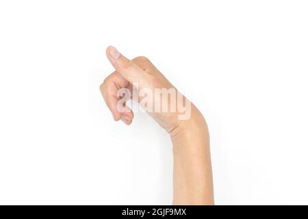 Krämpfe der Handmuskulatur beim asiatischen jungen Mann. Einseitige Handdeformität. Anormale Beugung der Finger. Isoliert auf weißem Hintergrund. Textbereich vorhanden. Stockfoto