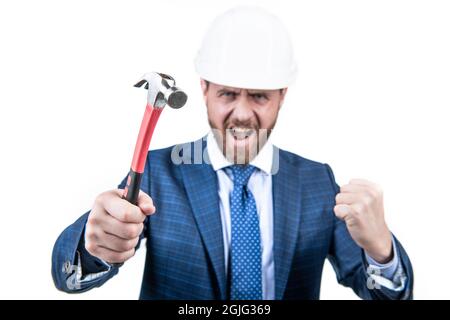 Ich nagele es. Verrückter Ingenieur hält Hammer selektiven Fokus. Hammerarbeit Stockfoto