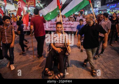 Jabalia, Palästina. September 2021. Unterstützer pflp bei einer Demonstration zur Unterstützung von Gefangenen, die am 09. September 2021 in israelischen Gefängnissen in Jabalia im nördlichen Gaza-Streifen festgehalten wurden. Foto von Habboud Ramez/ABACAPRESS.COM Quelle: Abaca Press/Alamy Live News Stockfoto