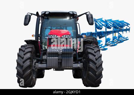 Traktor mit landwirtschaftlichem Pflug Stockfoto