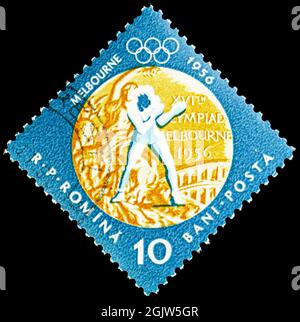 MOSKAU, RUSSLAND - 20. JUNI 2021: Briefmarke in Rumänien zeigt Boxing, rumänische Goldmedaillengewinnerinnen bei der 16. Und 17. Serie der Olympischen Sommerspiele, CIR Stockfoto