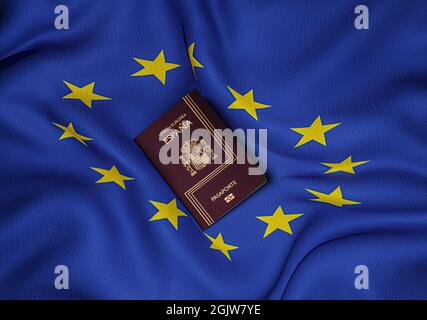 Spanischer Reisepass mit der Flagge der Europäischen Union in der Mitte des Fotos, Draufsicht Stockfoto