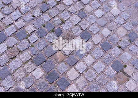 Alte Pflastersteinpflaster Nahaufnahme Hintergrund und Textur Stockfoto