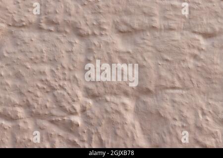 Textur der alten Wand mit taupe Putz bedeckt Stockfoto