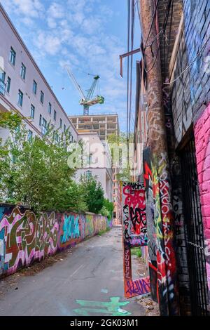 Die Grafitti Alley befindet sich im Fashion District in der Innenstadt von Toronto, Ontario. Drei Häuserblocks von der Spadina Avenue südlich der Queen Stree entfernt Stockfoto