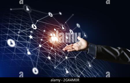 Moderne drahtlose Technologien als Mittel zur Communucation und Vernetzung auf dunklem Hintergrund zu präsentieren Stockfoto
