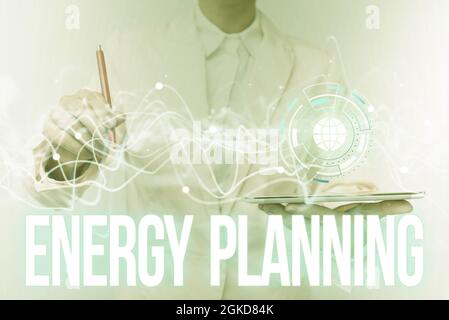 Inspiration zeigt Zeichen Energieplanung. Geschäftskonzept Erstellung einer Strategie und Plan für den Verbrauch von Energie Lady in Uniform verwenden Stockfoto