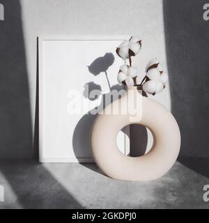 Baumwollblumen in einer stilvollen runden Vase. Schatten an der Wand. Konzept der Inneneinrichtung. Platz für Text kopieren Stockfoto