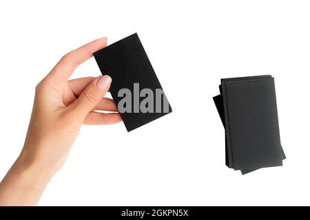 Schwarze Visitenkarte in der Hand des Mädchens Stockfoto