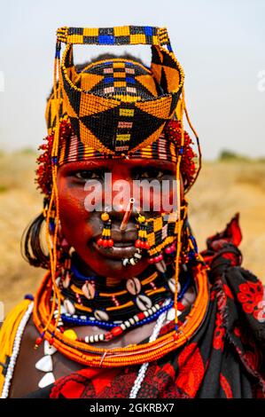 Traditionell gekleidete Frau des Stammes der Jiye, Staat der östlichen Äquatorien, Südsudan, Afrika Stockfoto