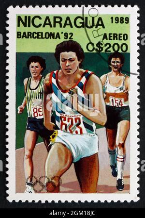 NICARAGUA - UM 1989: Eine in Nicaragua gedruckte Briefmarke zeigt Running, Olympische Sommerspiele 1992, Barcelona, Spanien, um 1989 Stockfoto