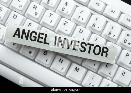 Textschild mit Angel Investor. Business-Ansatz High-Net-Wert Einzelperson, die finanzielle Unterstützung bietet Eingabe New Edition von Informations-eBook Stockfoto