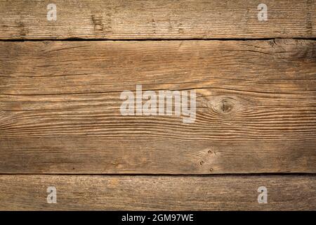 rustikale verwitterte Holz Hintergrund mit Getreide und Knoten Stockfoto