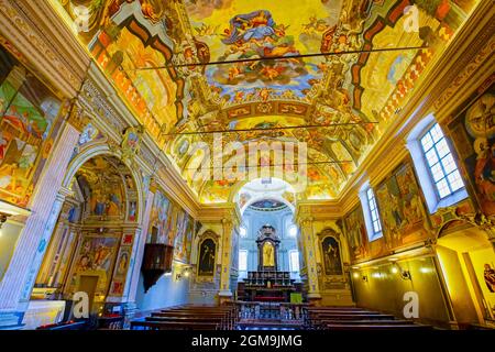 San Rocco in Lugano, erbaut 1580-1597 von der Bruderschaft St. Rocco. Lugano, Kanton Tessin. Schweiz. Die evozierende Bewunderung Fresken des Innenraums, Stockfoto