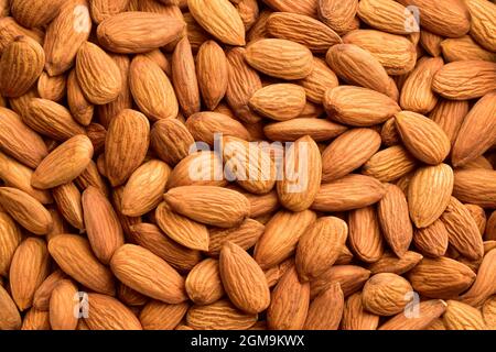 Mandelnüsse Hintergrund. Mandelansicht von oben. Stockfoto