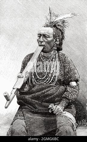 Der gebürtige Amerikaner aus Indien raucht im Jardin d'Acclimatation in Paris, Frankreich, eine Pfeife. Europa. Alte, gravierte Illustration aus dem 19. Jahrhundert von La Nature 1883 Stockfoto
