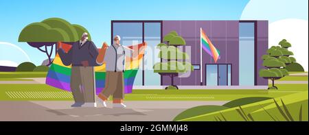 Ältere schwule Paar mit Regenbogenfahne in der Nähe des neuen modularen Hauses Transgender Liebe LGBT Community-Konzept Stock Vektor
