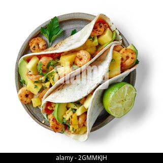 Teller mit mexikanischen Speisen Tacos isoliert auf weißem Hintergrund, Draufsicht Stockfoto