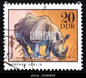 DDR - UM 1975: Eine in der DDR gedruckte Briefmarke zeigt Rhinozeros, Berlin, Deutscher Zoologischer Garten, um 1975 Stockfoto