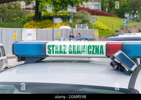 Schild Polnischer Grenzschutz (polnische Straz Graniczna, auch abgekürzt als SG). Stockfoto