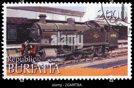 MOSKAU, RUSSLAND - 6. NOVEMBER 2019: Briefmarke gedruckt in Cinderellas zeigt Lokomotive, buritiatische Russland Serie, um 1997