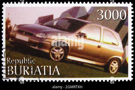 MOSKAU, RUSSLAND - 6. NOVEMBER 2019: Briefmarke in Cinderellas zeigt Sportautos, buritiatische Russland-Serie, um 1997 Stockfoto