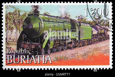 MOSKAU, RUSSLAND - 6. NOVEMBER 2019: Briefmarke gedruckt in Cinderellas zeigt Lokomotive, buritiatische Russland Serie, um 1997