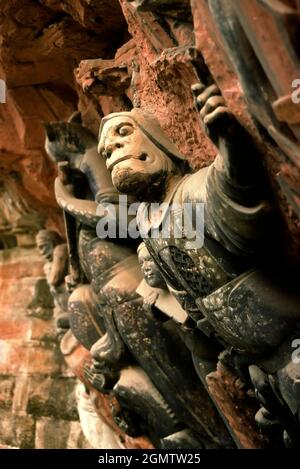 Chongqing, Sichuan, China - Dezember 1997 die spektakulären Felsschnitzereien von dazu in Sichuan sind eine vielfältige Serie chinesischer religiöser Skulpturen und Carvi Stockfoto