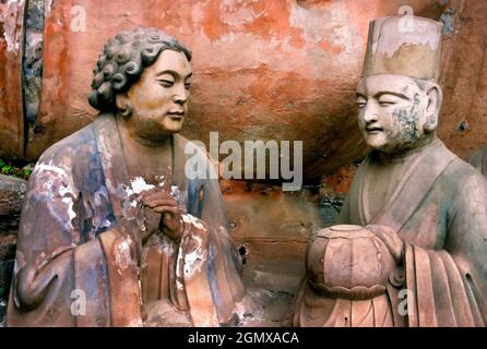 Chongqing, Sichuan, China - Dezember 1997 die spektakulären Felsschnitzereien von dazu in Sichuan sind eine vielfältige Serie chinesischer religiöser Skulpturen und Carvi Stockfoto