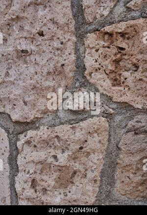 Ordentlich eingelegte Steinwand bilden eine dekorative Stockfoto