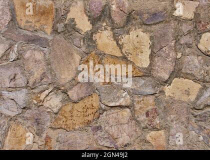 Ordentlich eingelegte Steinwand bilden eine dekorative Stockfoto