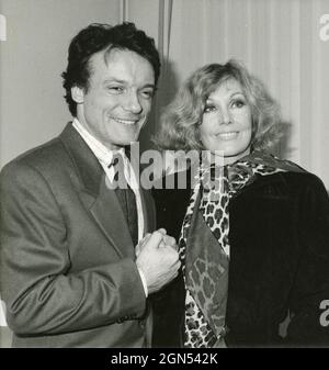 Die amerikanische Schauspielerin Kim Novak und der italienische Sänger Massimo Ranieri bei der Fernsehshow Fantastico Cinema, 1989 Stockfoto