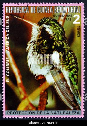 ÄQUATORIALGUINEA - UM 1977: Eine in Äquatorialguinea gedruckte Marke zeigt Colibri, Kolibri, Kolibri, Südamerikanischer Vogel, um 1977 Stockfoto
