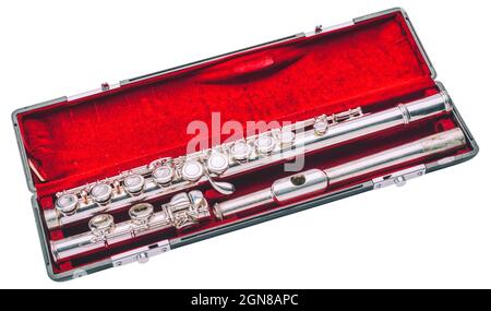 Konzertflöte in Box mit rotem Samt auf weißem Hintergrund Stockfoto