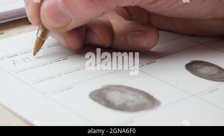 Formular ausfüllen Makro Fingerabdruck Registrierung Fingerabdruck Formular Papierkram Stockfoto