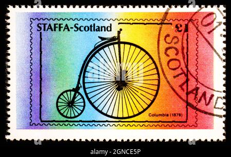 STAFFA, SCHOTTLAND - UM 1978: Eine in Schottland gedruckte Briefmarke zeigt Columbia 1878 Stockfoto