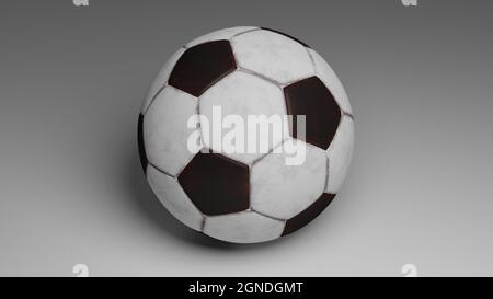 Nahaufnahme eines schwarz-weißen Fußballs auf grauem Hintergrund Stockfoto