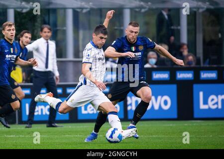 Mailand, Italien - september 25 2021 - Serie A Spiel F.C. Internazionale - Atalanta BC San Siro Stadion - malinovski ruslan in Aktion während des Spiels und mailand Skriniar Stockfoto