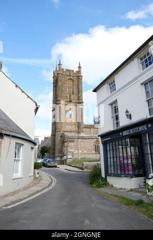 Die Pfarrkirche St. Mary im Dorf Cerne Abbas, Dorset, England Stockfoto