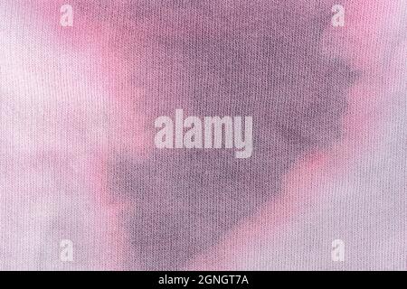 Modische Tie-Dye-Qualität. Baumwollhintergrund Textur für Design. Rosa Textur für jeden Hintergrund. Ökologisch angebaute Baumwolle. Hochwertige Fotos Stockfoto