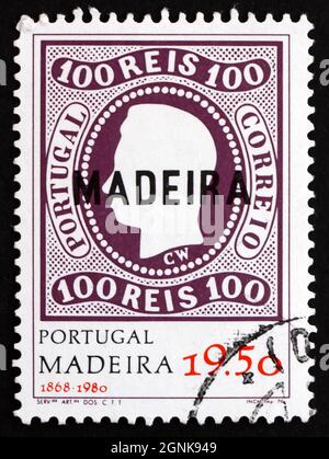 PORTUGAL, MADEIRA - UM 1980: Eine in Portugal gedruckte Marke zeigt König Luiz, 112. Jahrestag der ersten Madeira-Briefmarkenausgabe, um 1980 Stockfoto