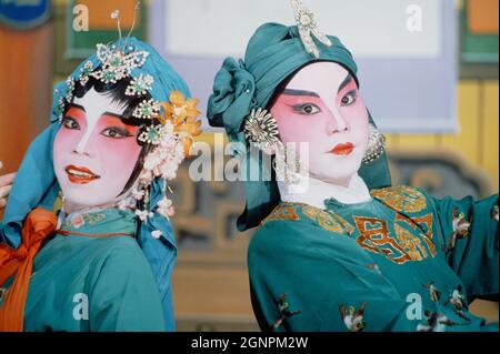 Chinesische Kultur. Mann und Frau an der Chinesischen Oper. Singapur. Stockfoto